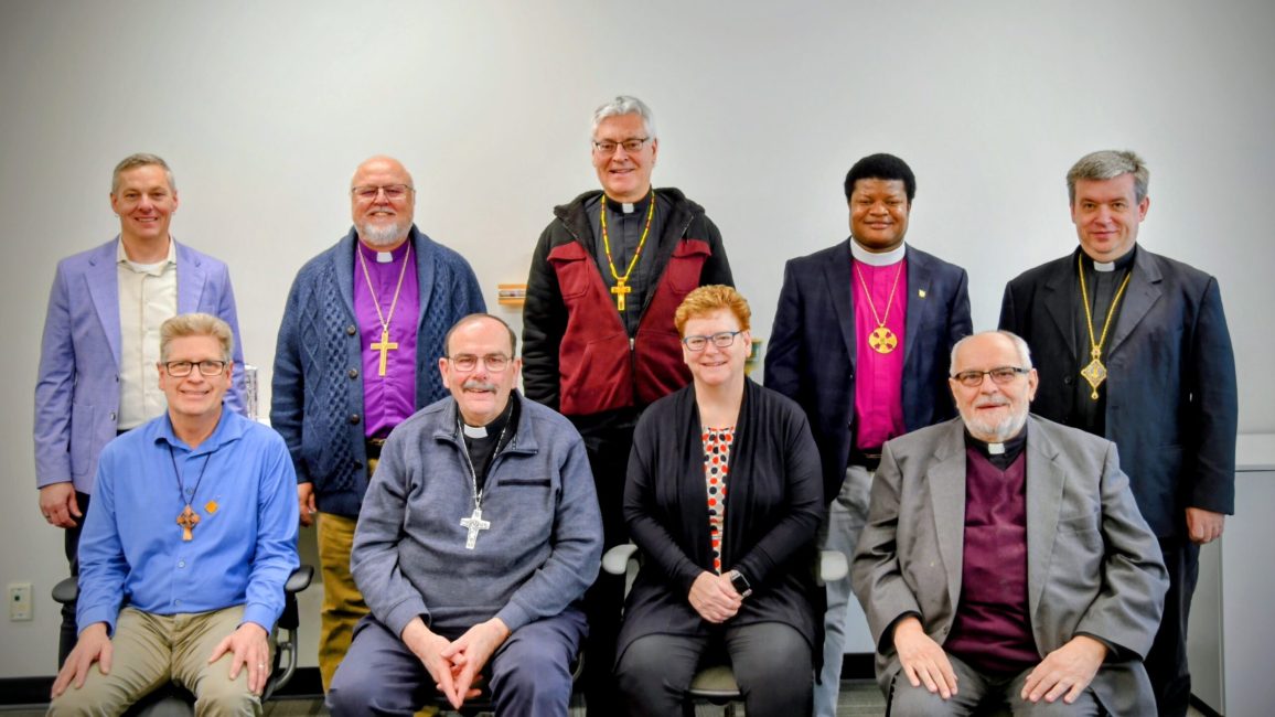 Back row, L to R:  
Bishop Jason Zinko, MNO Synod, Evangelical Lutheran Church in Canada (ELCIC)
Bishop Larry Kochendorfer, National Bishop, Evangelical Lutheran Church in Canada
Archbishop Murray Murray Chatlain. Roman Catholic Archdiocese of Winnipeg
Bishop Naboth Manzongo, Anglican Diocese of Rupert’s Land
Bishop Andriy Rabiy, Ukrainian Catholic Archeparchy of Winnipeg.

Front row, L to R:  
Rev. Paul Gehrs, ELCIC Assistant to the National Bishop 
Archbishop Albert LeGatt, Roman Catholic Diocese of Saint Boniface
Rev. Shannon McCarthy, United Church of Canada - Executive Minister, Northern Spirit, 
       					Prairie to Pine and Living Skies Regional Councils
Most Rev. Lawrence Huculak, Metropolitan, Ukrainian Catholic Archeparchy of Winnipeg